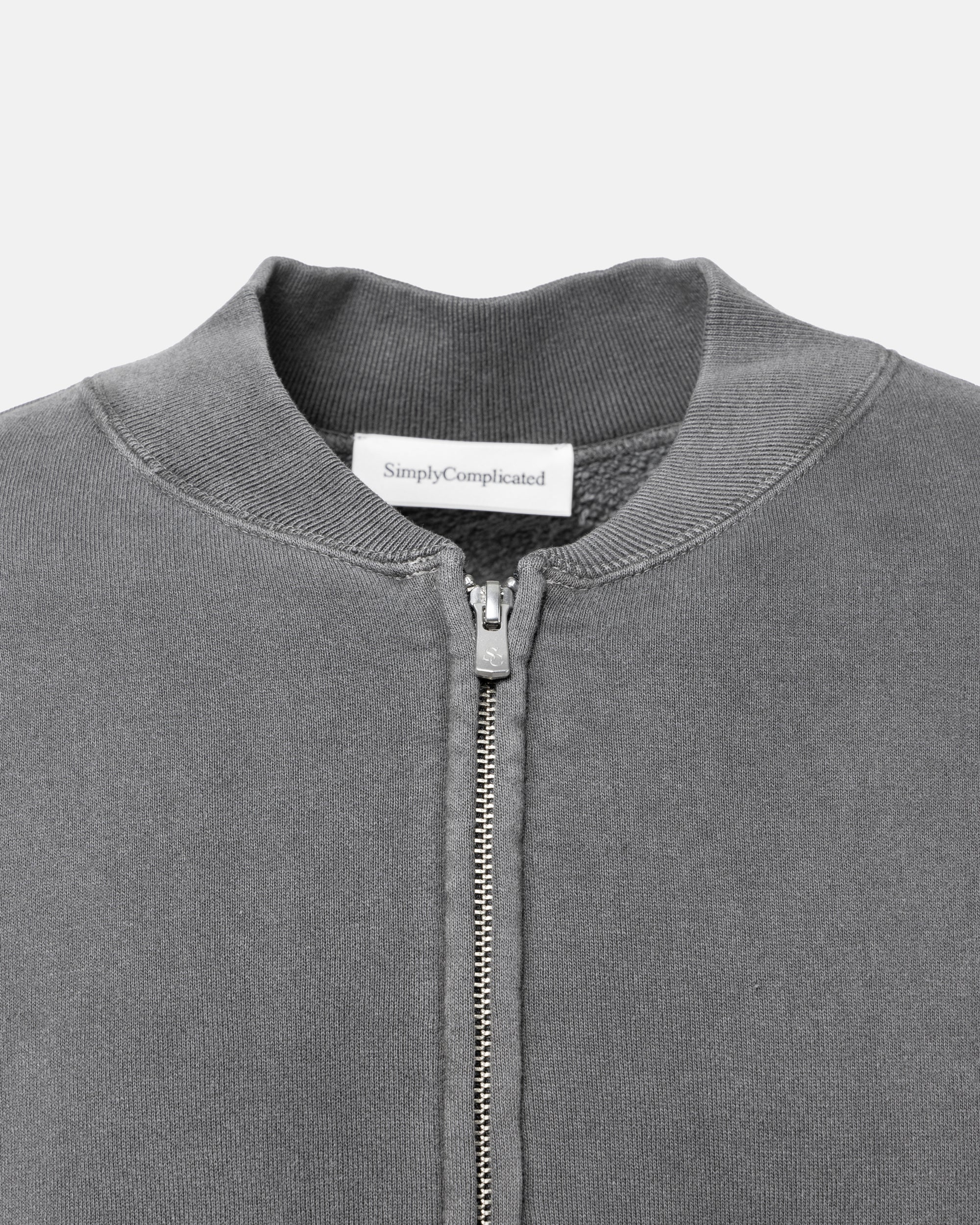 CORE LOOPWHEEL ZIP OVER CREW BLACK